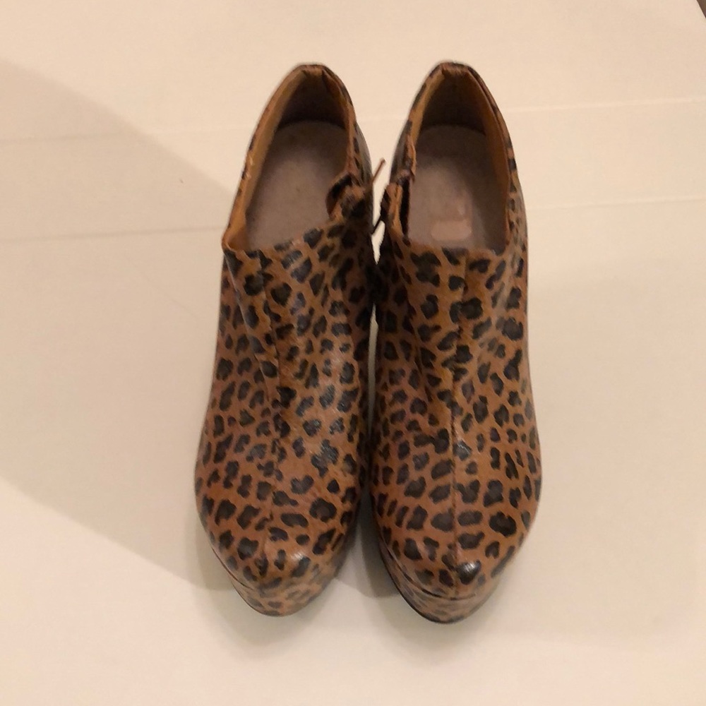 Bebe platform ankle cheetah boots